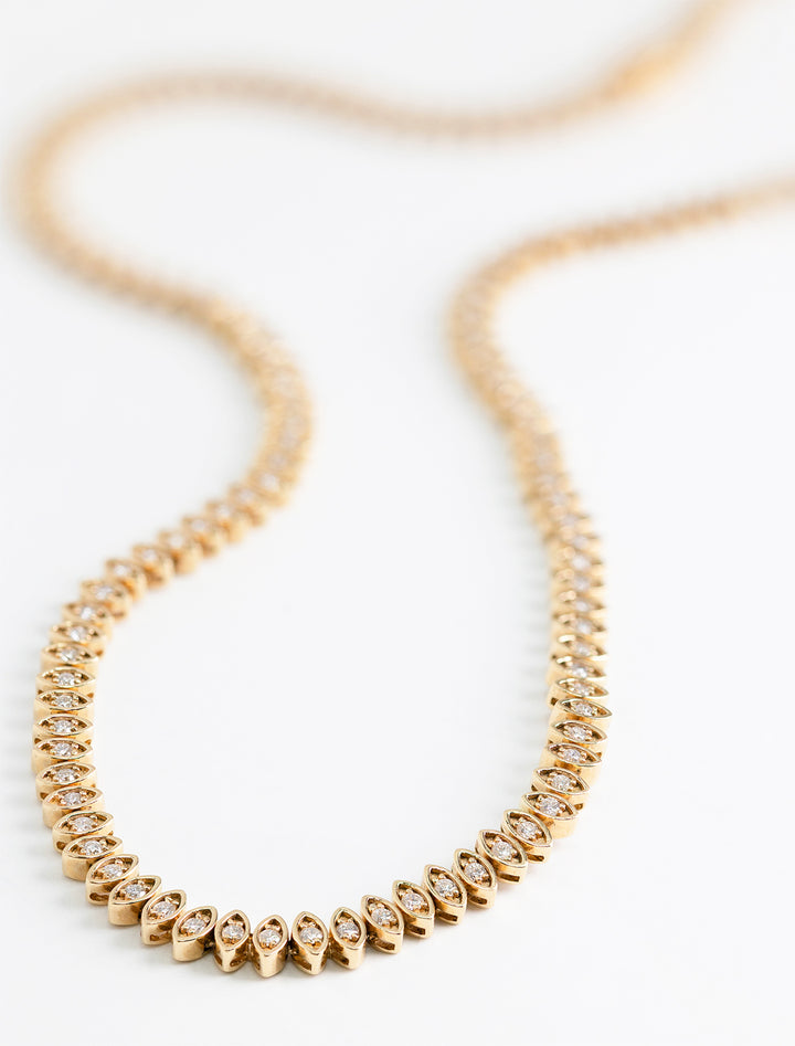 Close-up view of Sydney Evan's marquise eternity necklace.
