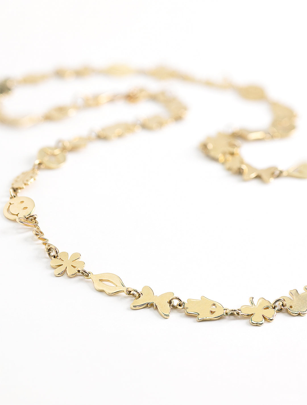 Close-up view of Sydney Evan's tiny pure link necklace.