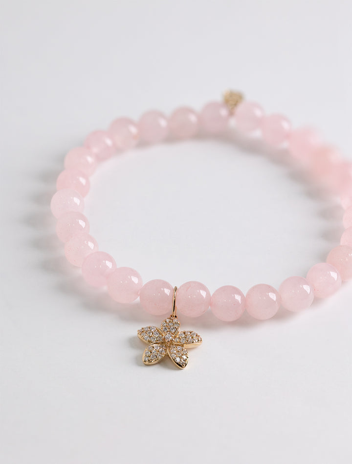 plumeria charm on rose quartz
