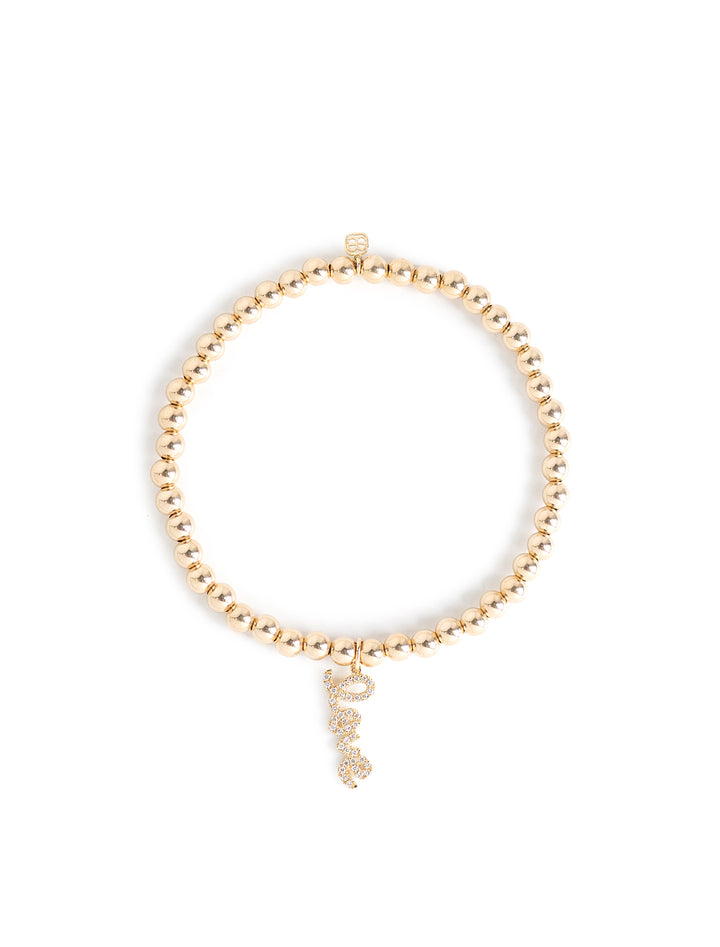 4mm mini pave "love" script charm on 14k gold