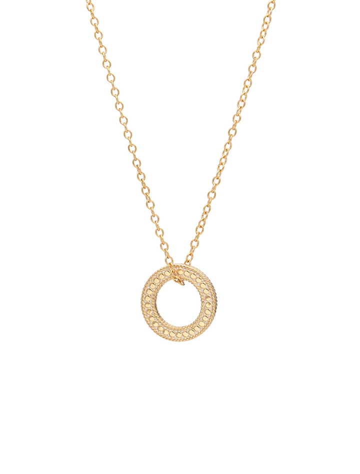 Front view of Anna Beck's circle of life necklace in gold.