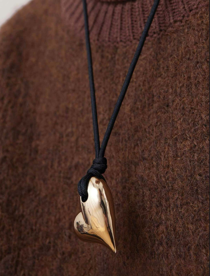 art heart on a string necklace in gold