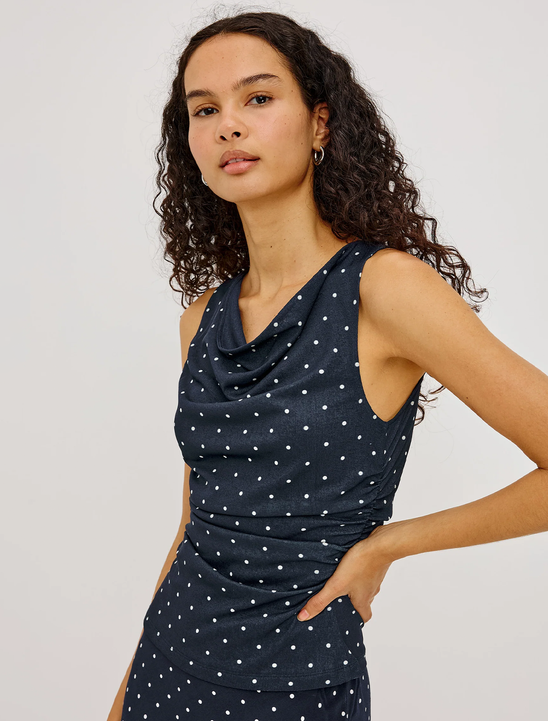 fete top in navy polka dots