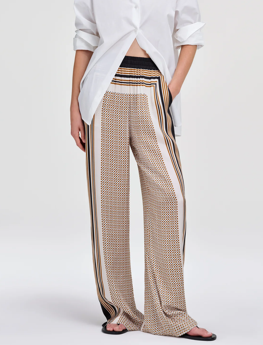 tyler pant in black and caramel dotted