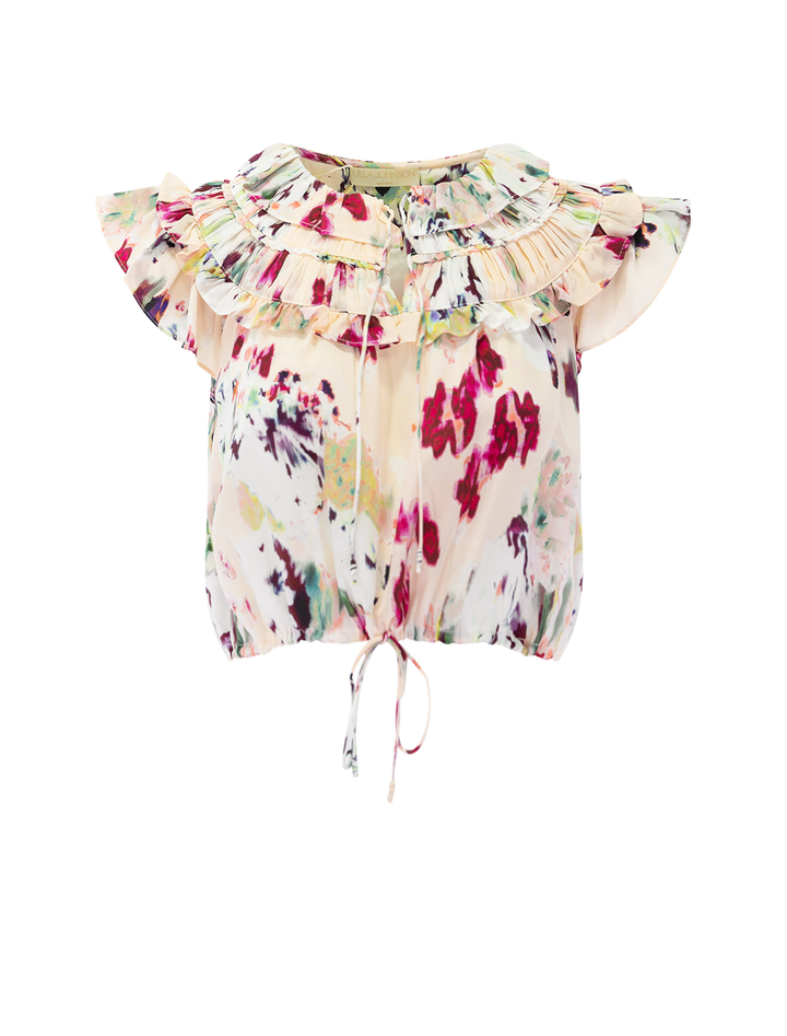 eleonore silk top in summer garden