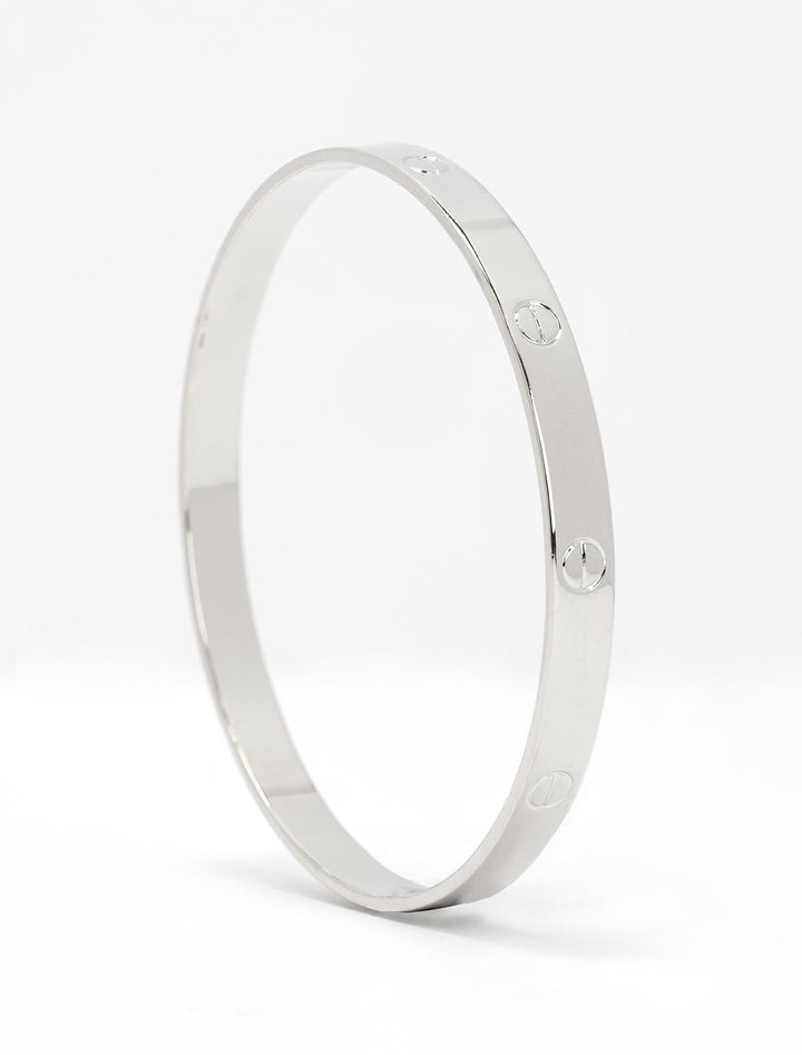 silver bangle with screw accents