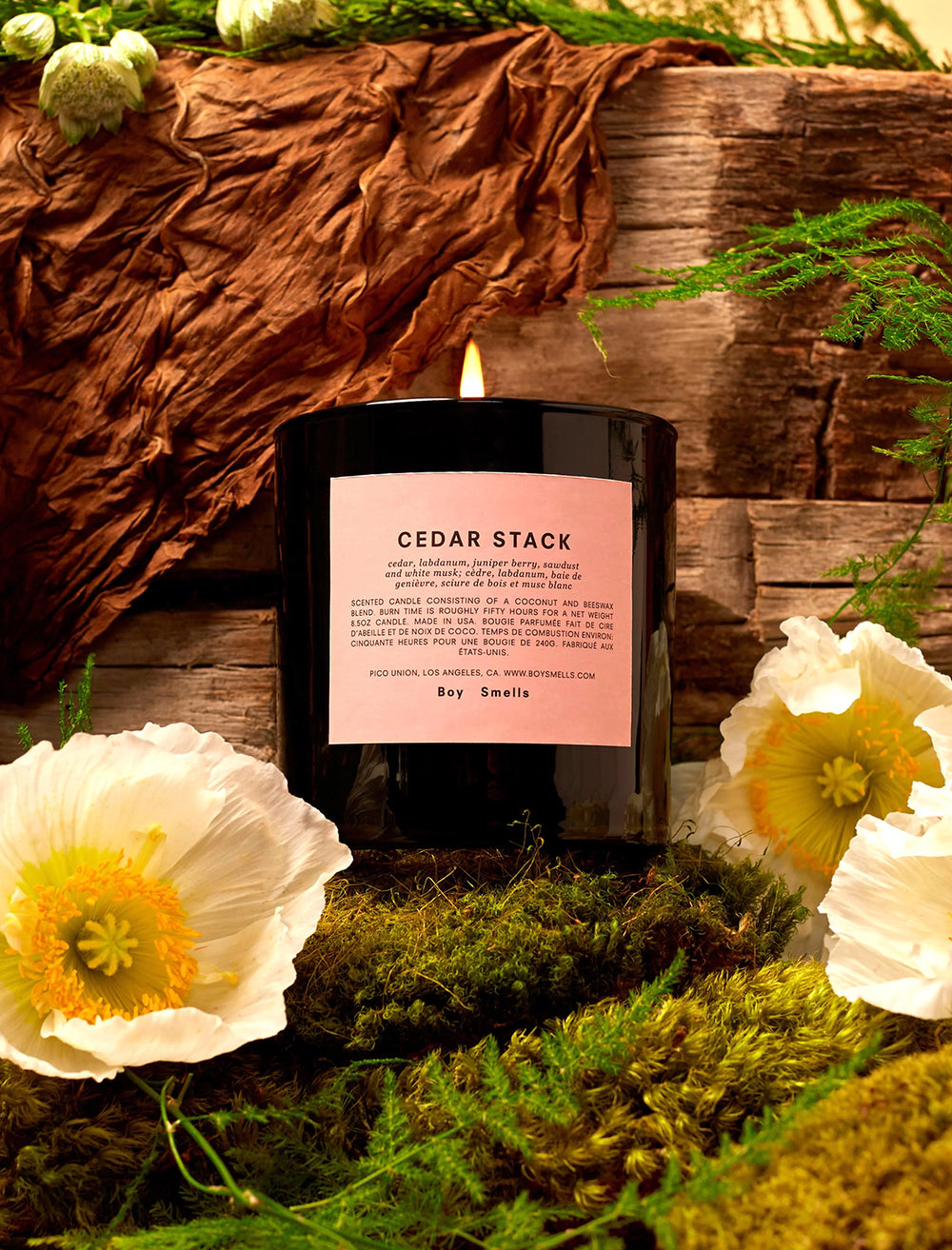 Campaign image of Boy Smells' Cedar Stack candle.