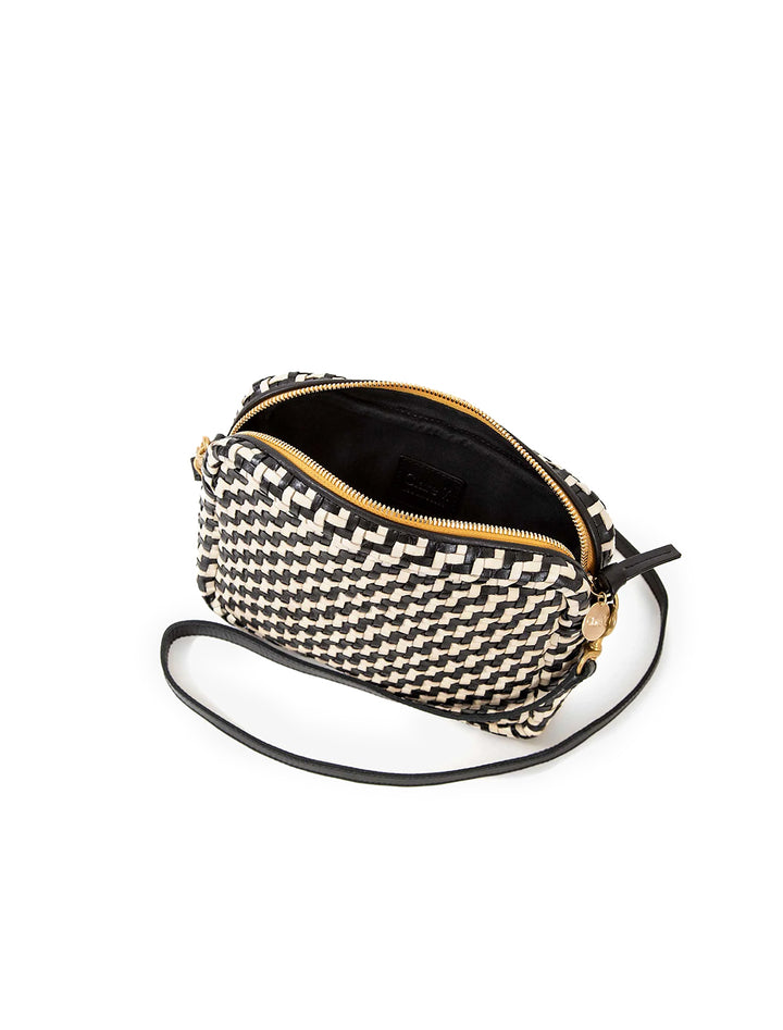 Overhead view of Clare V.'s woven midi sac in black and cream zig zag.