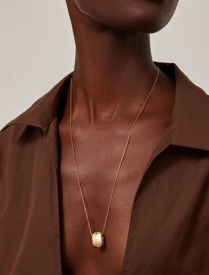 leon pendant necklace in gold