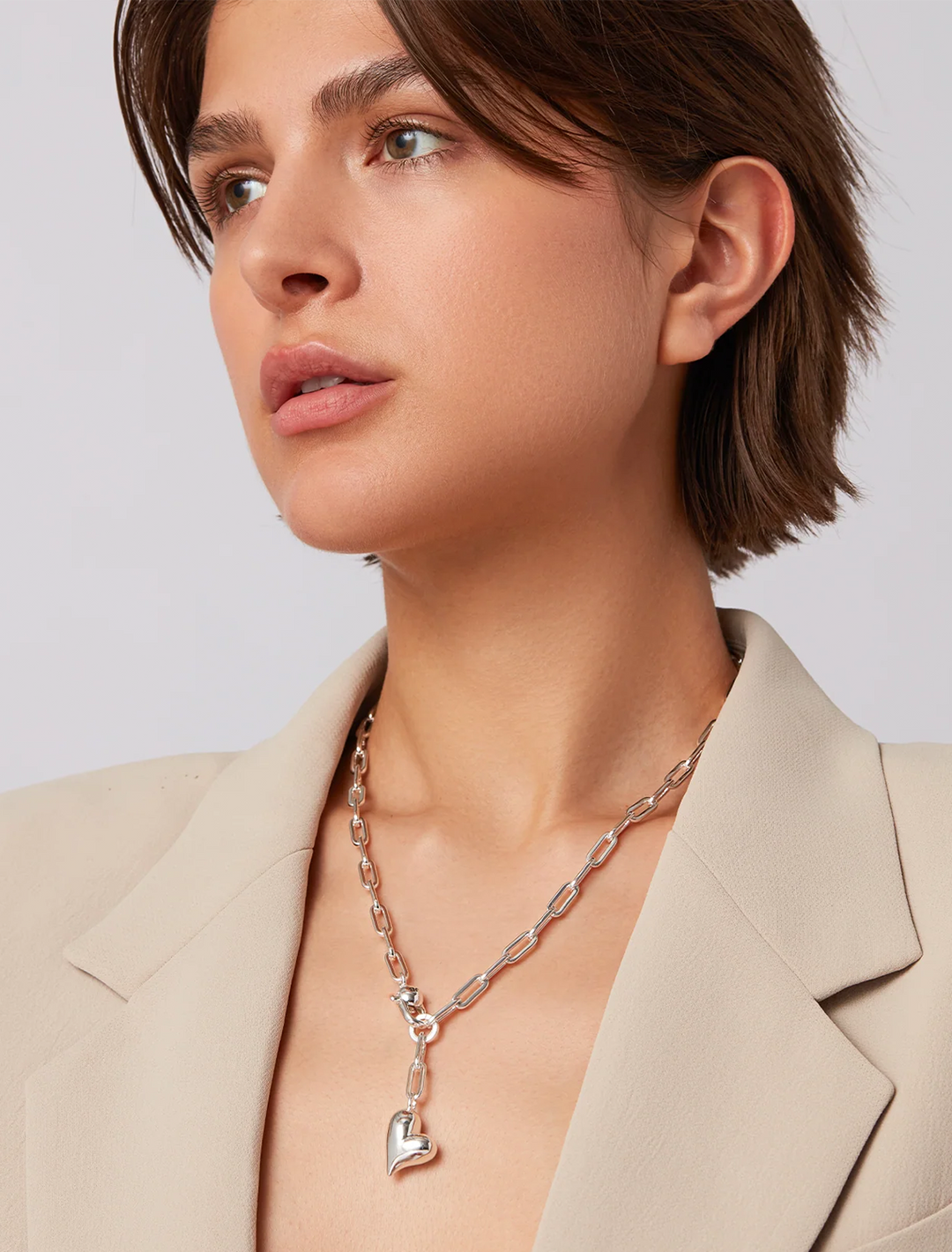 puffy heart necklace in silver