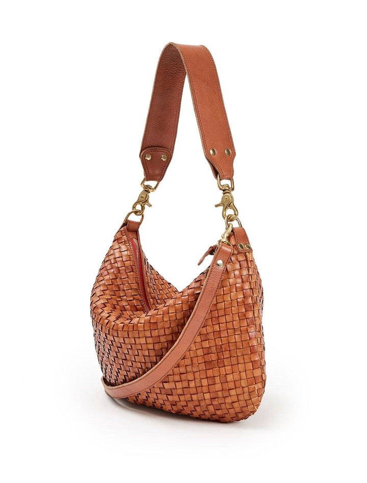 side angled view of moyen messenger in natural woven checker