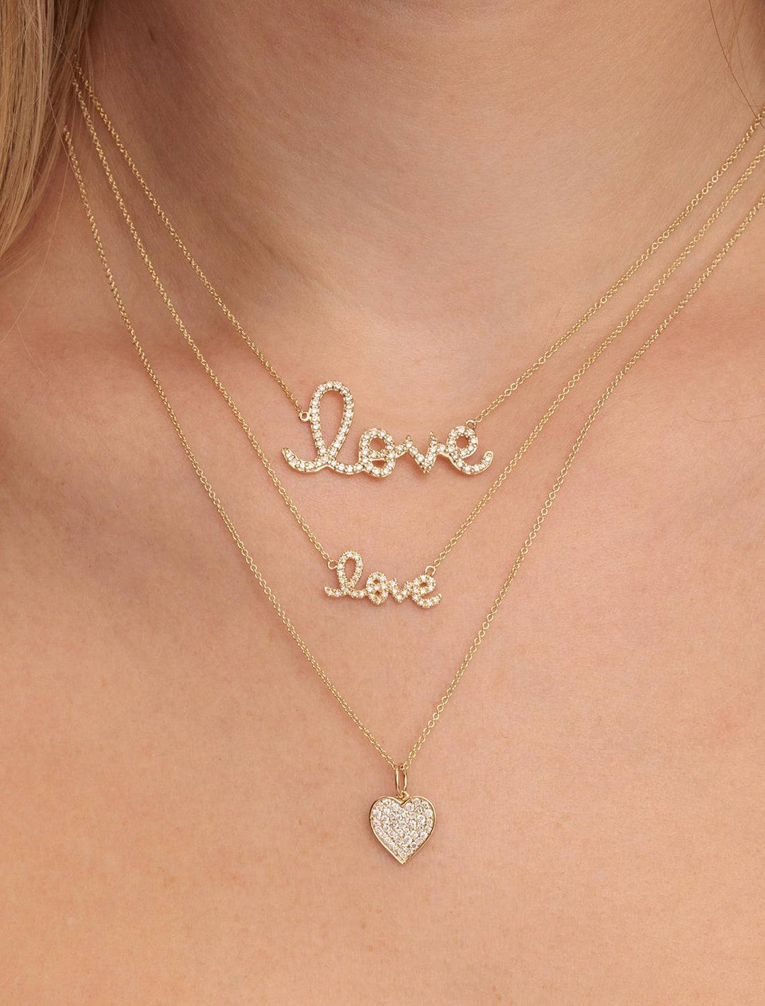 Sydney Evan's love script necklace.