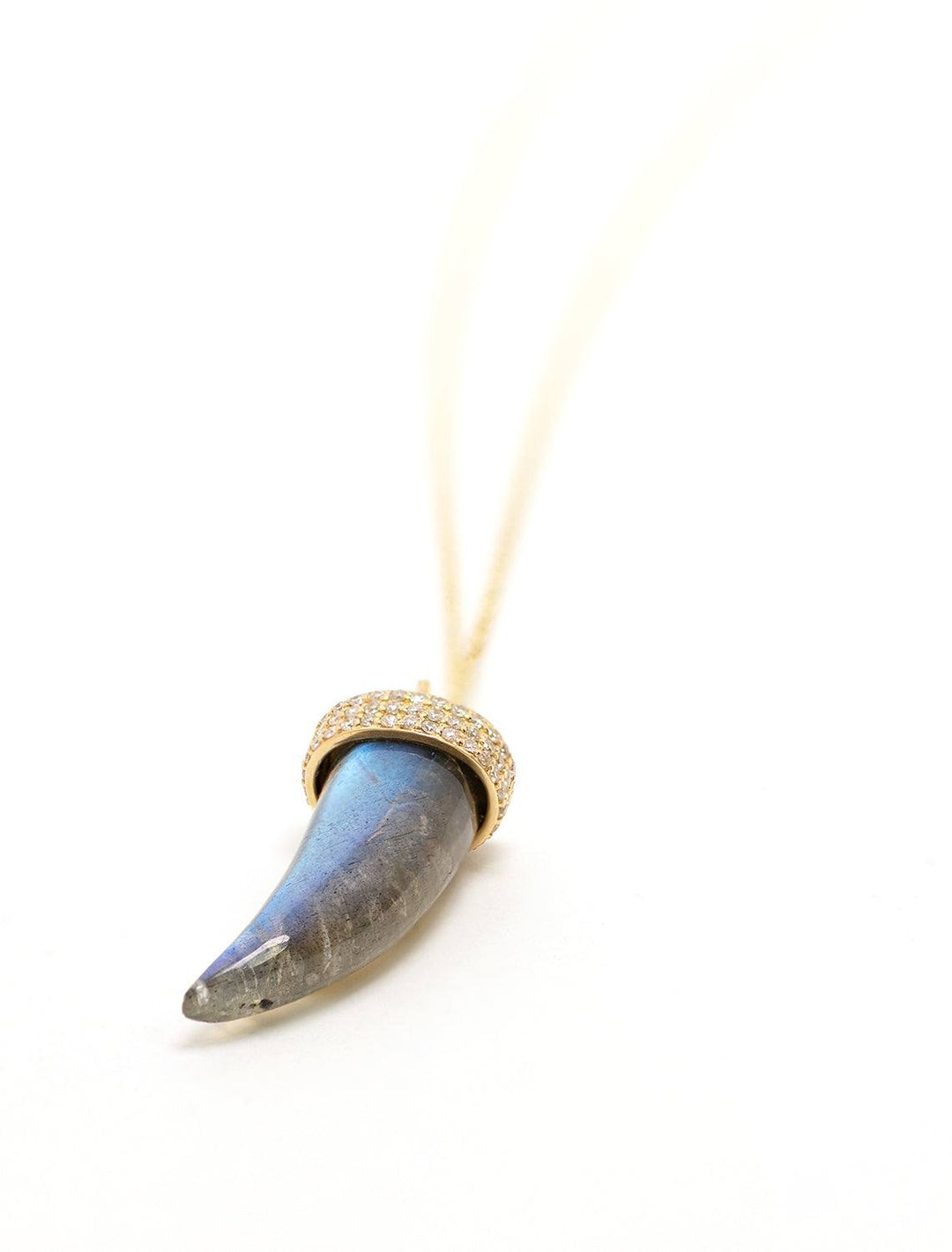 Close-up view of Sydney Evan's labradorite horn with diamond accents.
