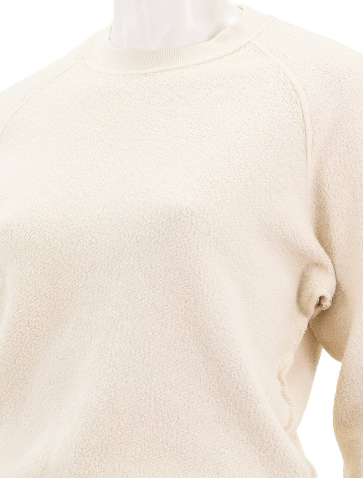 Close-up view of Perfectwhitetee's ziggy inside out sweatshirt in sugar.