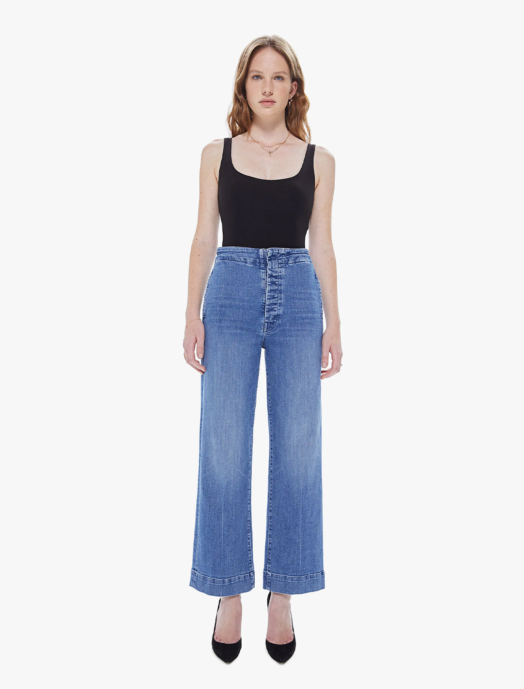model wearing the cinch greaser in sorry I'm staring with a black tank top and heels