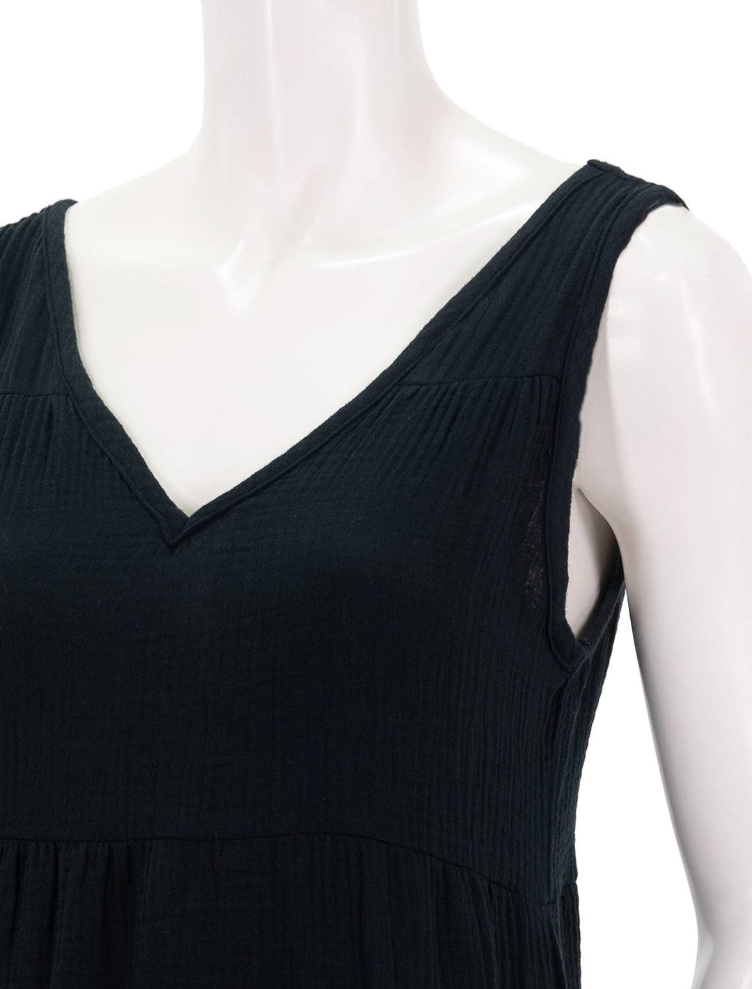 close up view of corinne dress in black v-neck