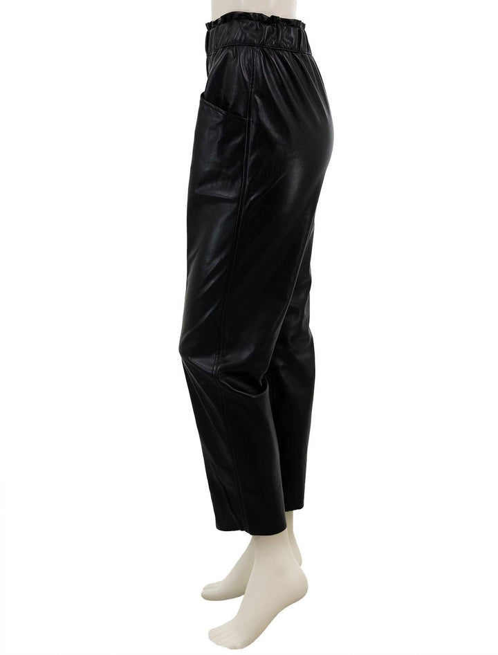 Side view of Sunday NYC's Harper Pant in Black Vegan Leather.