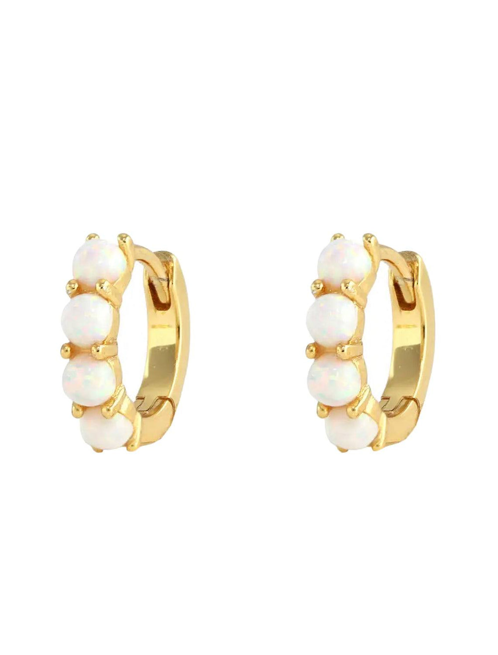 close up view of opal huggie hoops