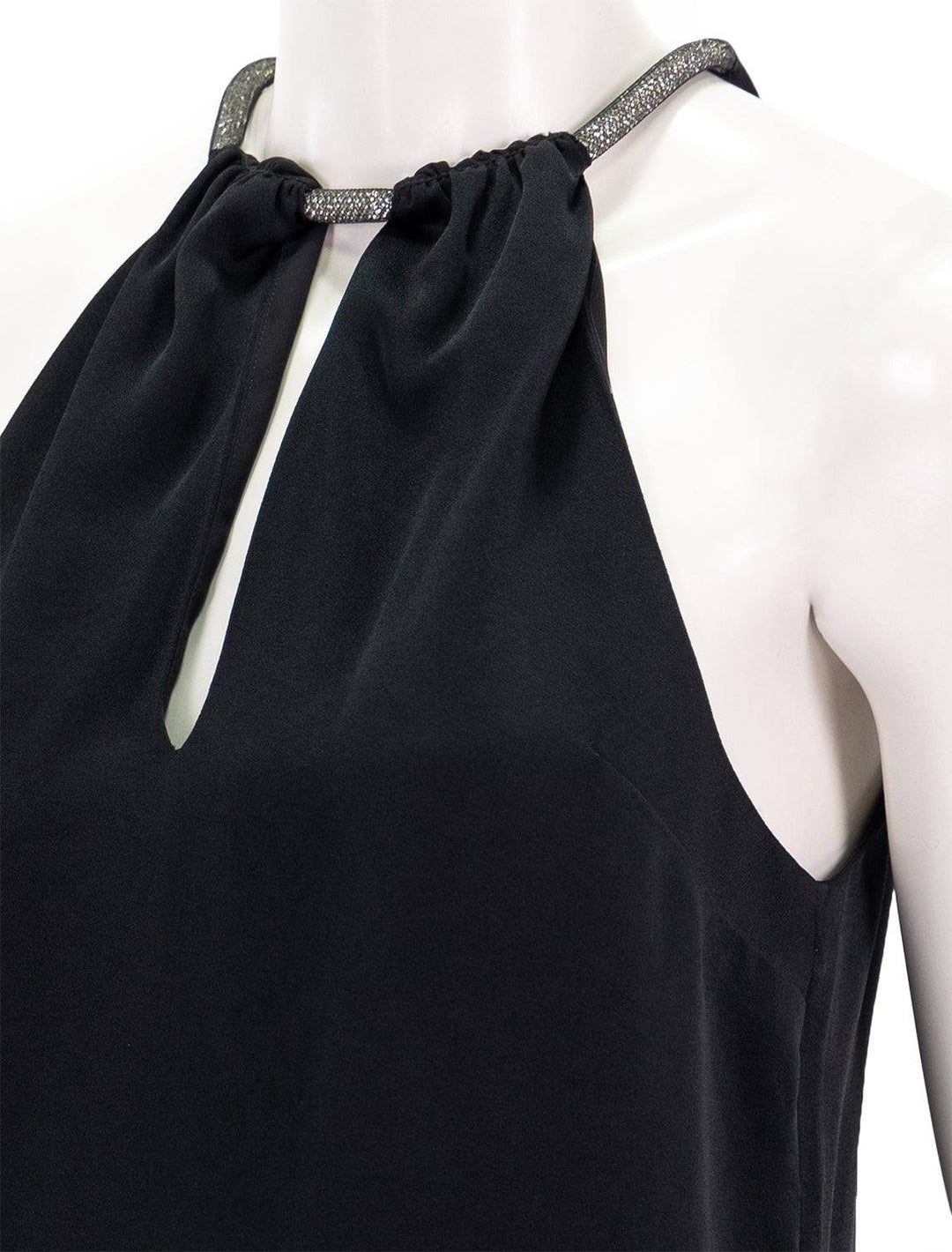 Close-up view of Veronica Beard's Kusumi Top in Black.