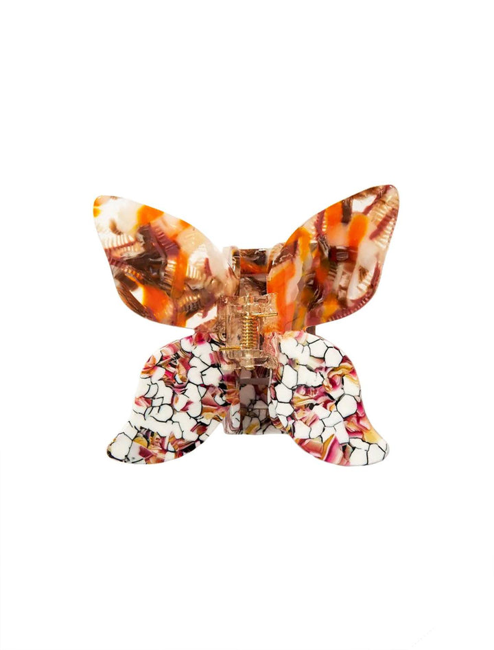 this hair claw has a butterfly shape. when clipped in hair, it looks like a butterfly is resting on your hair. perfect for casual style or semi-formal updo. this hair clip features orange and maroon tones.