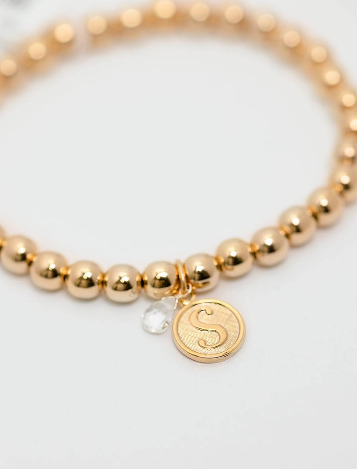 front view of beaded monogram bracelet | S charm and gem