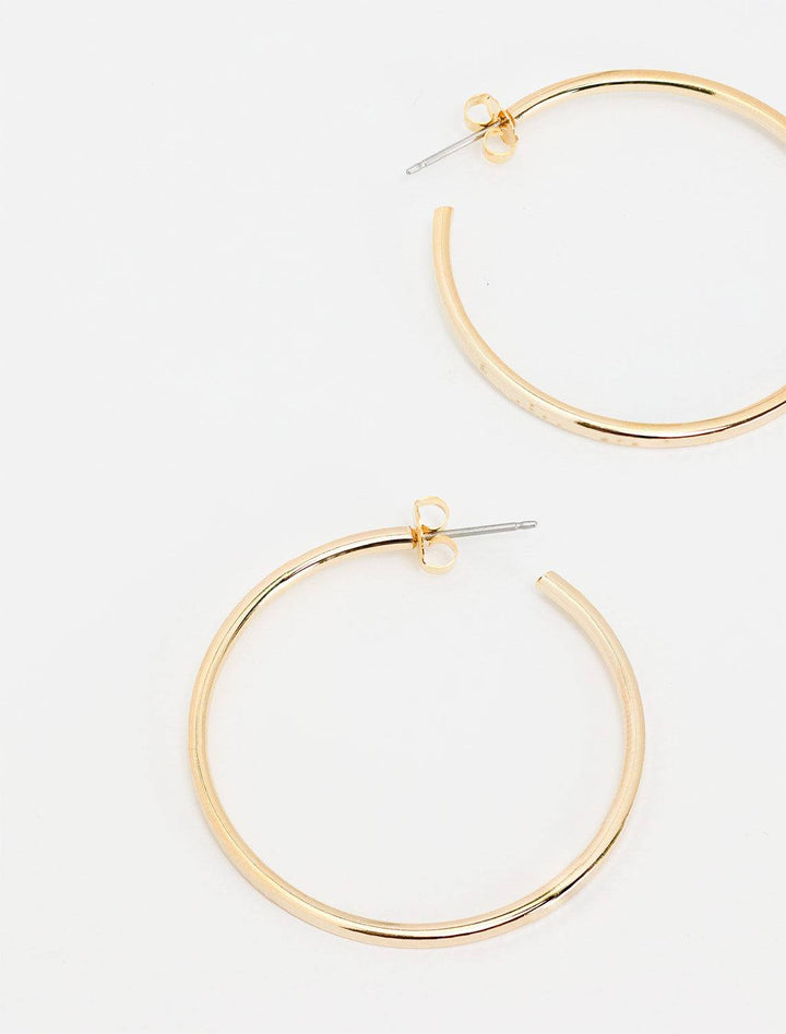 styled top down view of disco ball hoops in gold