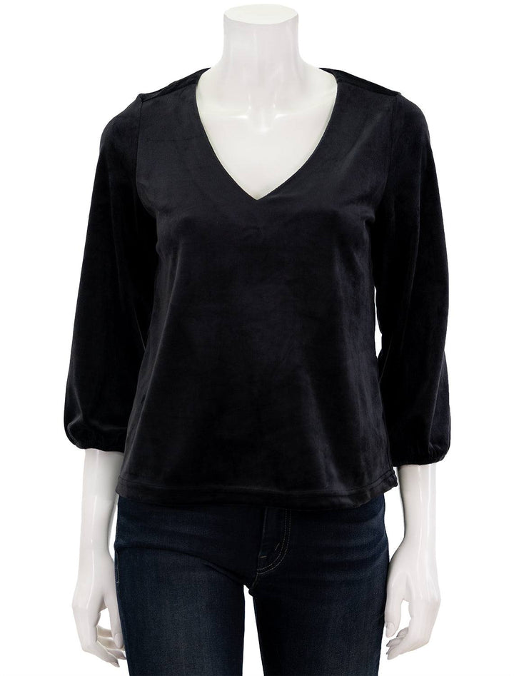 Front view of Marine Layer's velour v neck top in black.