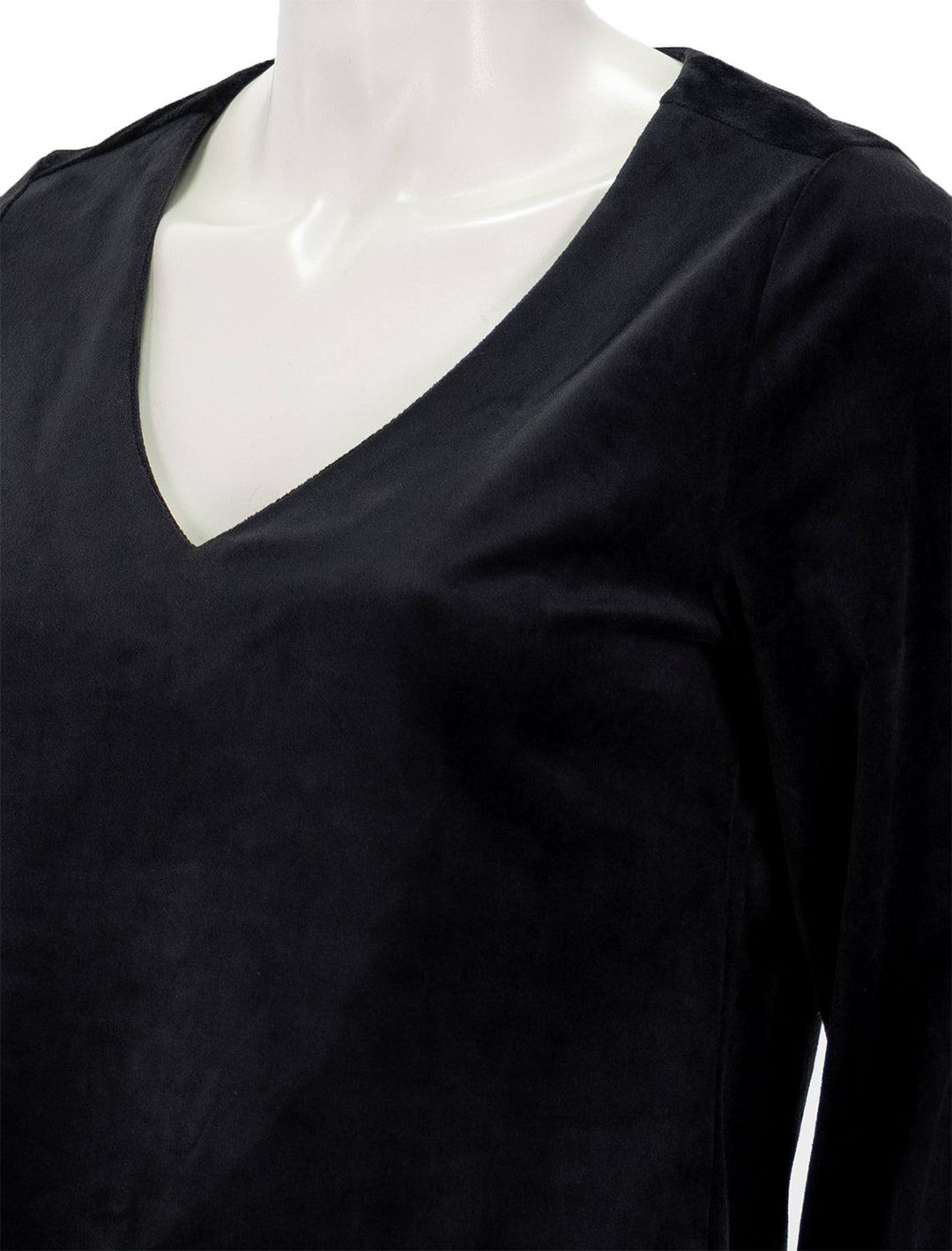 Close-up view of Marine Layer's velour v neck top in black.