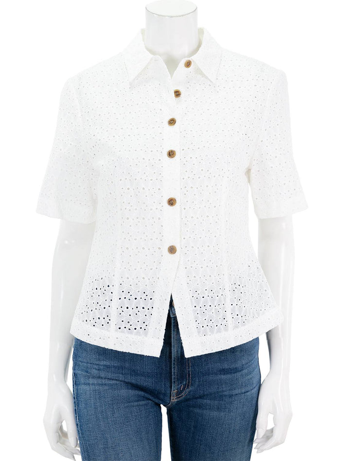 front view of lea eyelet short sleeve blouse in full moon