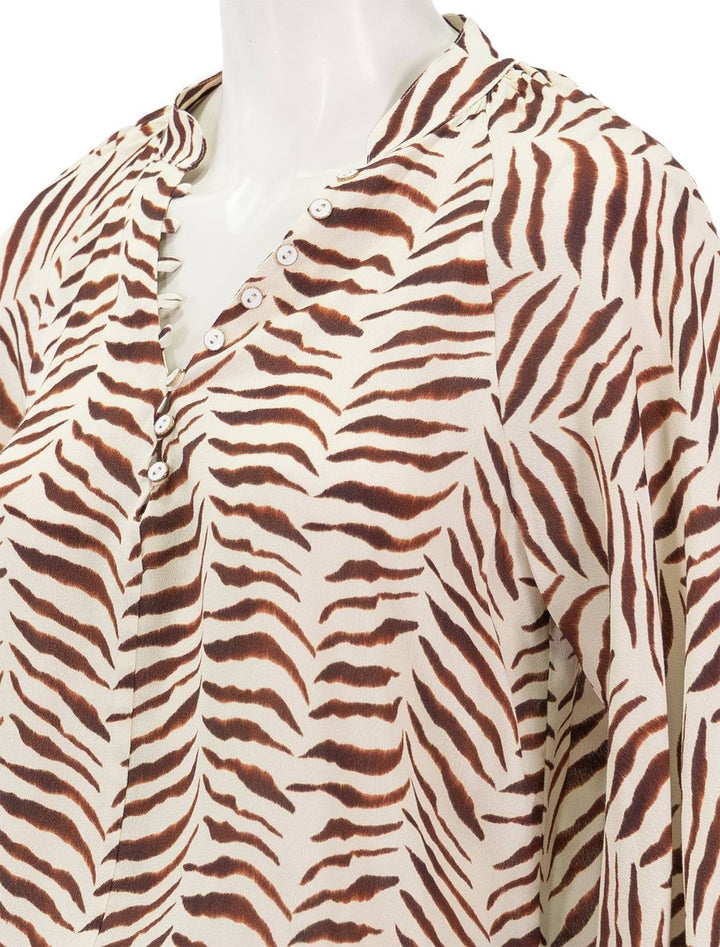 Close-up view of Corey Lynn Calter's noemie top in ivory.