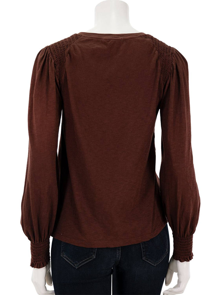 Back view of Sundry's smocked shoulder top in wine.