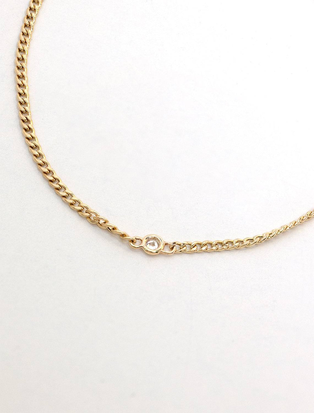Stylized laydown of Zoe Chicco's 14k extra small curb chain with floating diamond bracelet | 6-7"