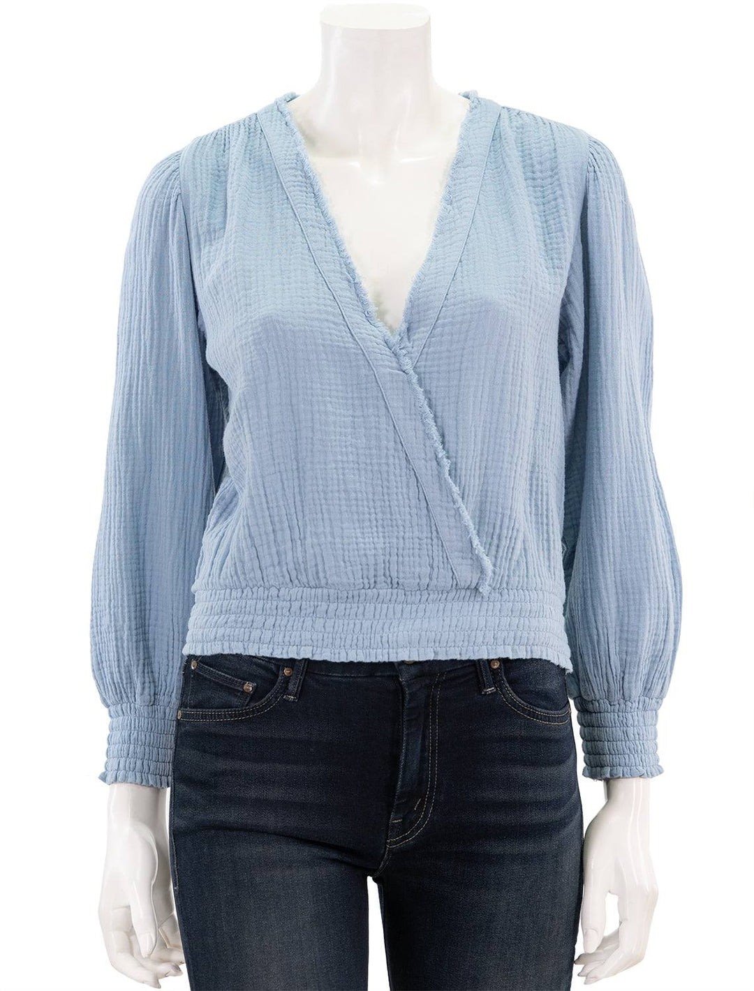 Front view of Sundays NYC's may top in dusty blue.