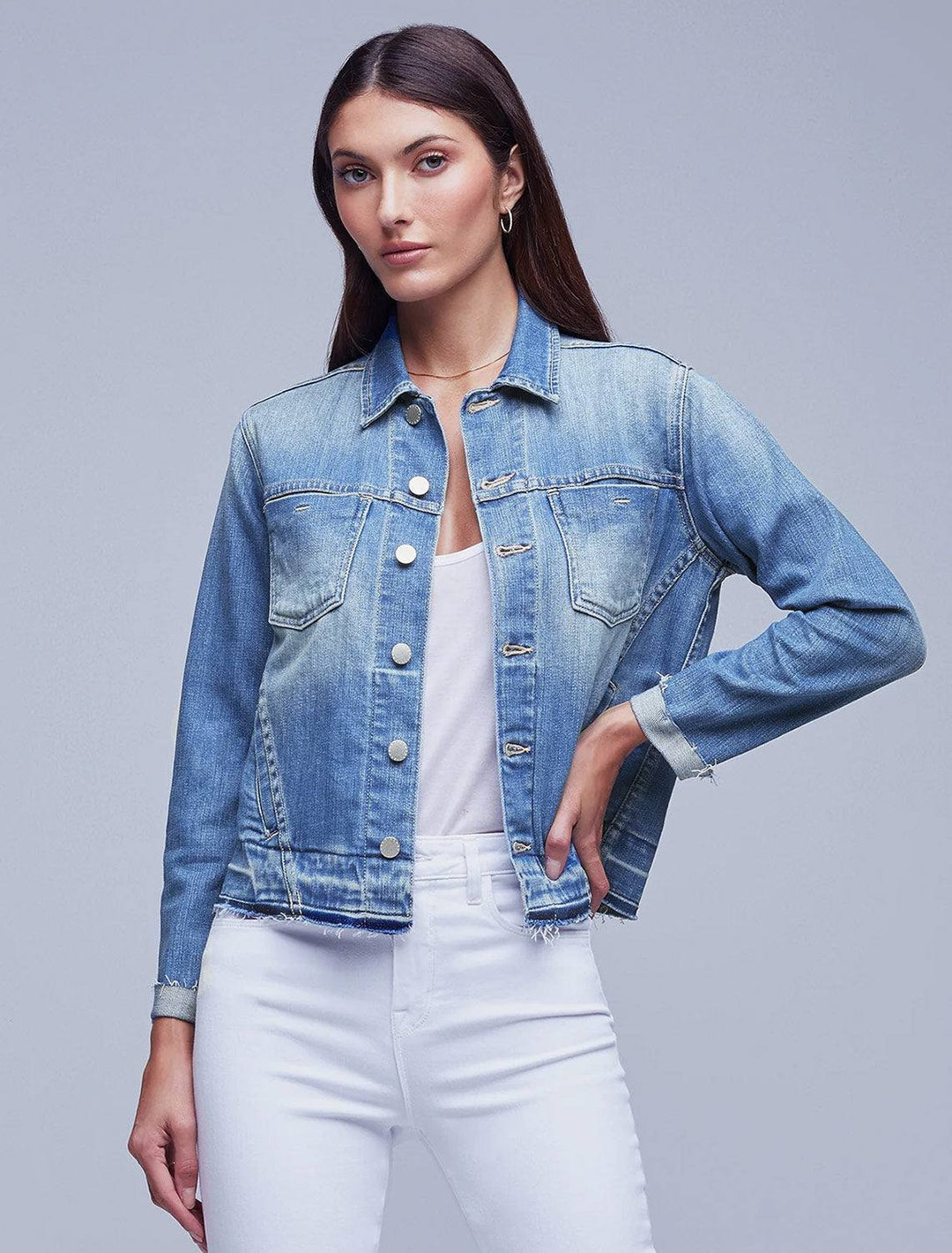 Model wearing L'agence's tatiana released hem jacket in basin.