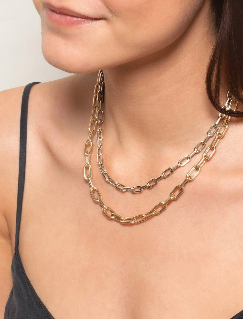 Model wearing Adina Reyter's 5.3mm wide 16" Italian chain link necklace in silver.