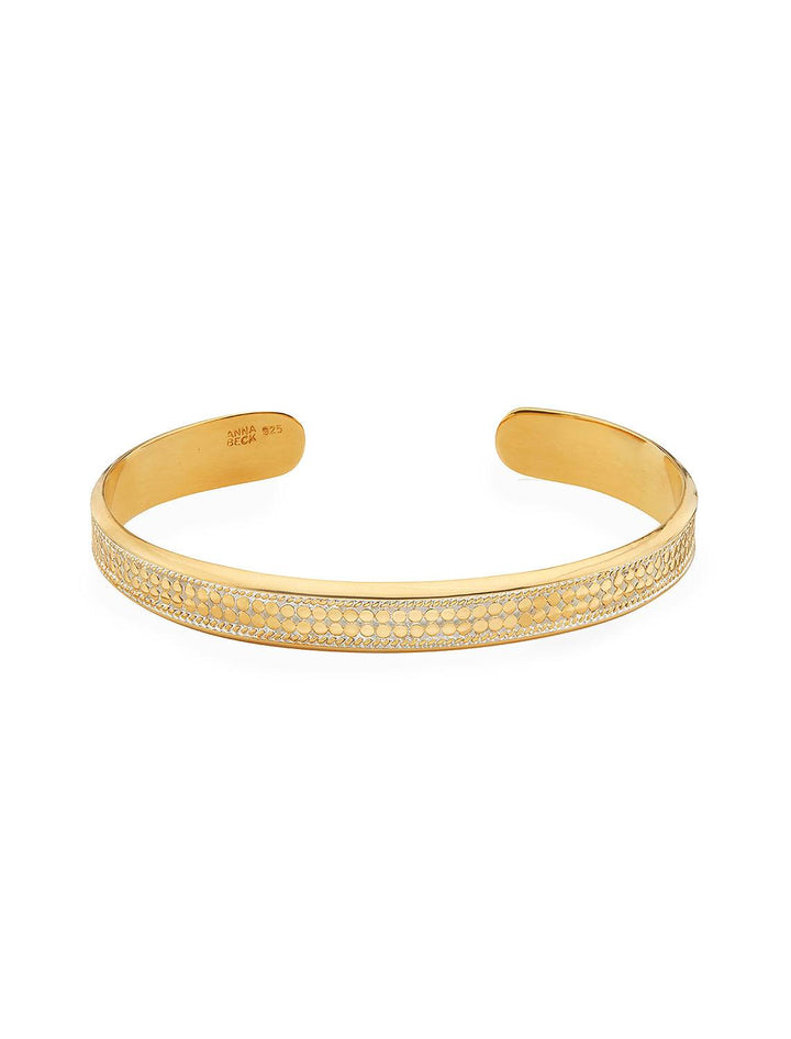 Front view of Anna Beck's Classic Wide Band Stacking Cuff in Gold.