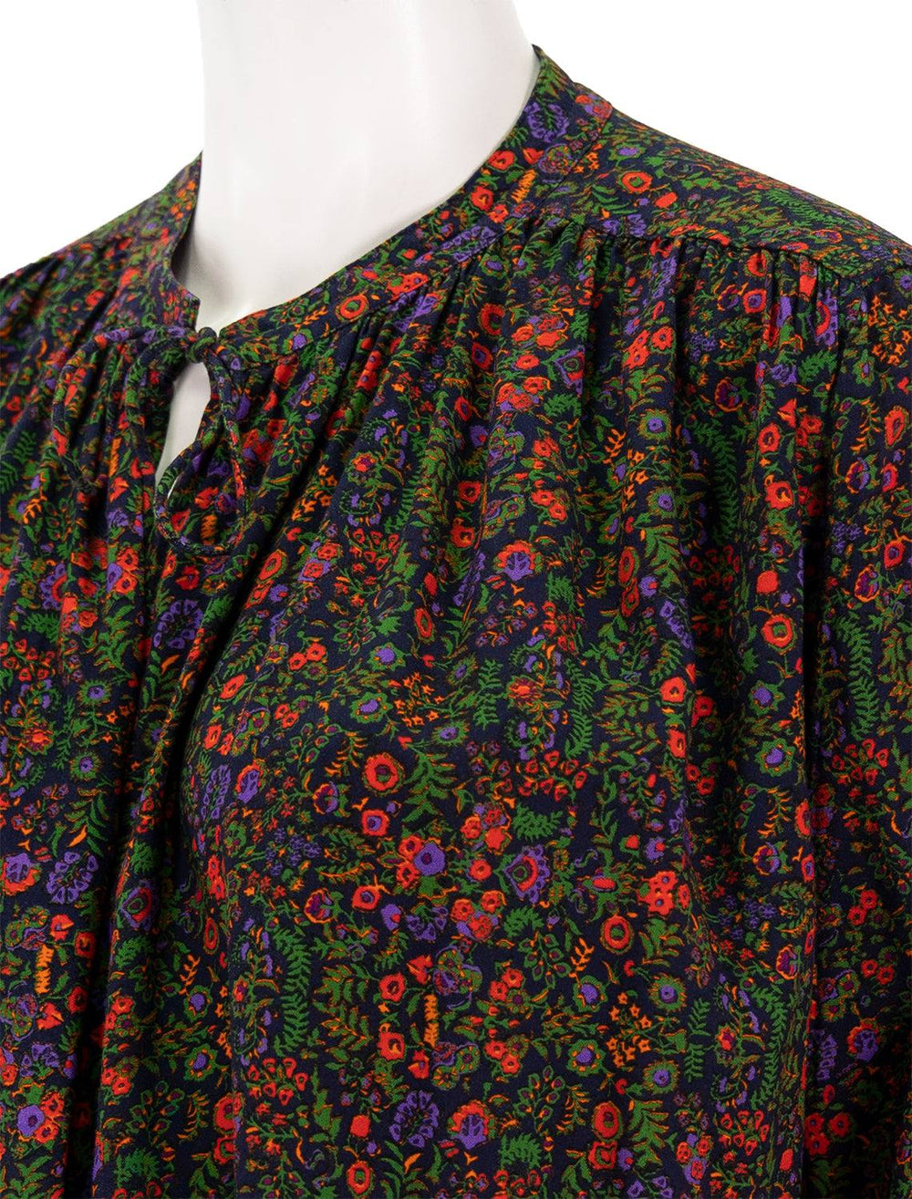 Close-up view of XIRENA's Ameli Top in Navy Floral.