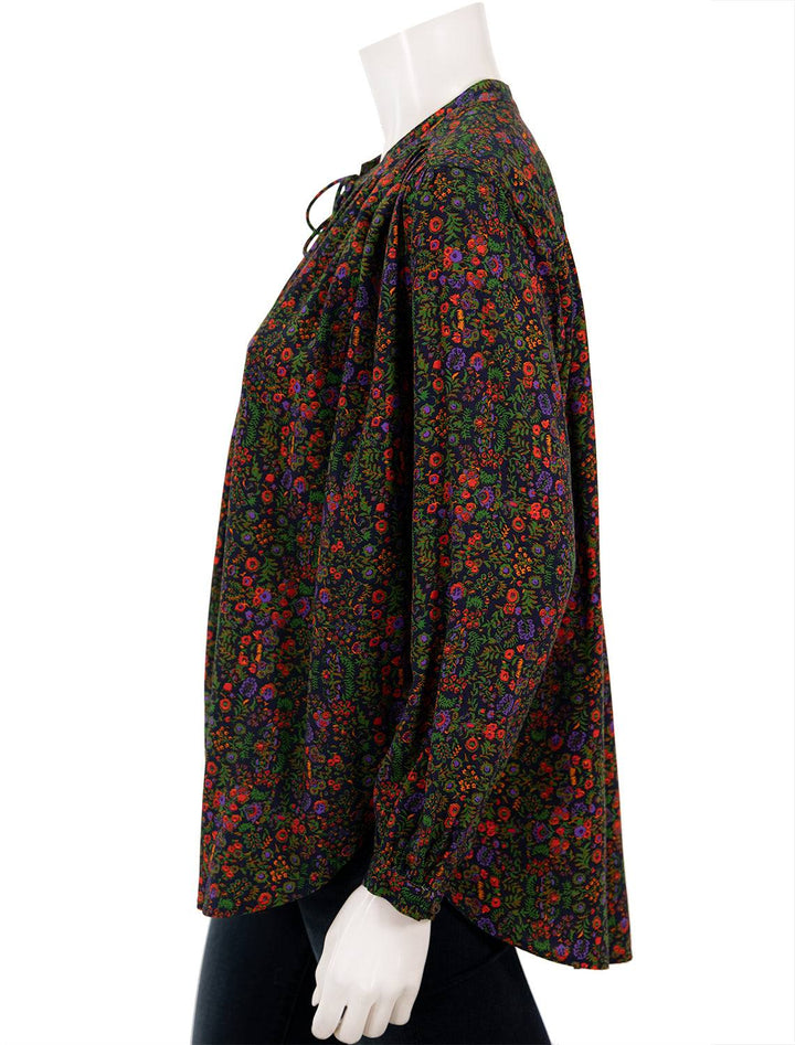 Side view of XIRENA's Ameli Top in Navy Floral.