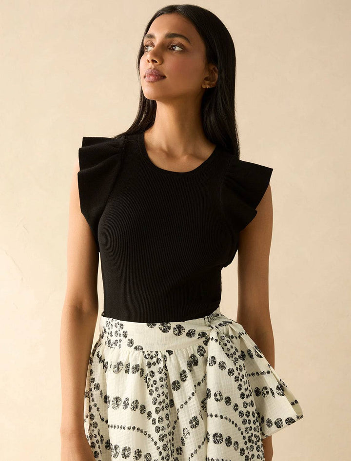 Model wearing Marie Oliver's rory top in black.