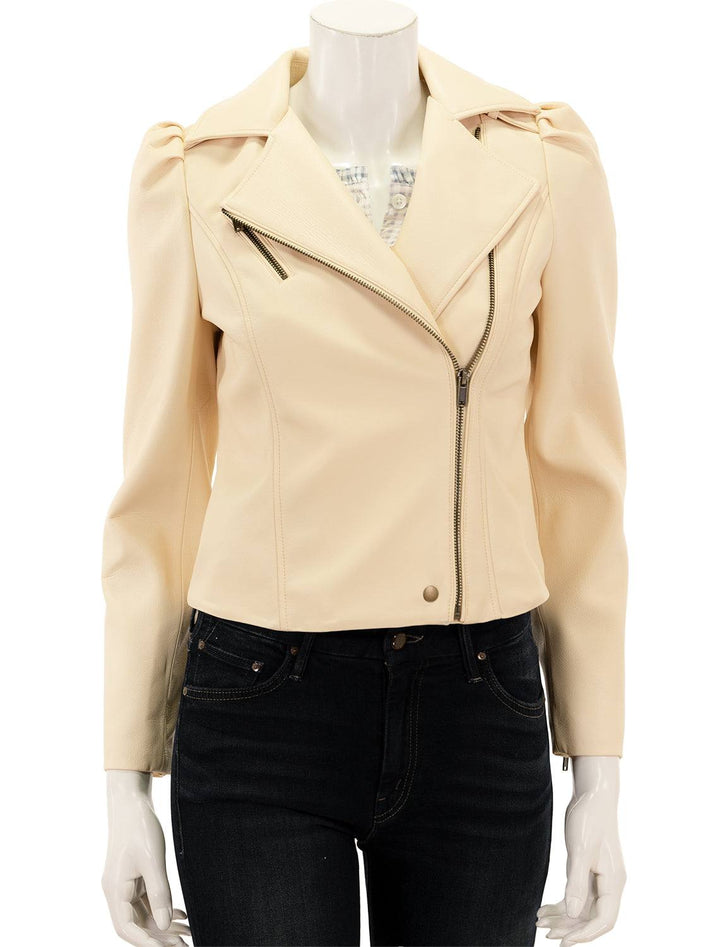 Front view of Marie Oliver's maeve moto jacket in sand, zipped.