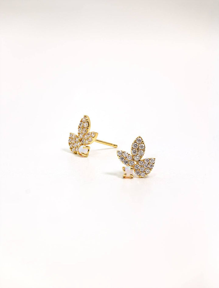 Tai jewelry's pave leaf studs with opal accent.