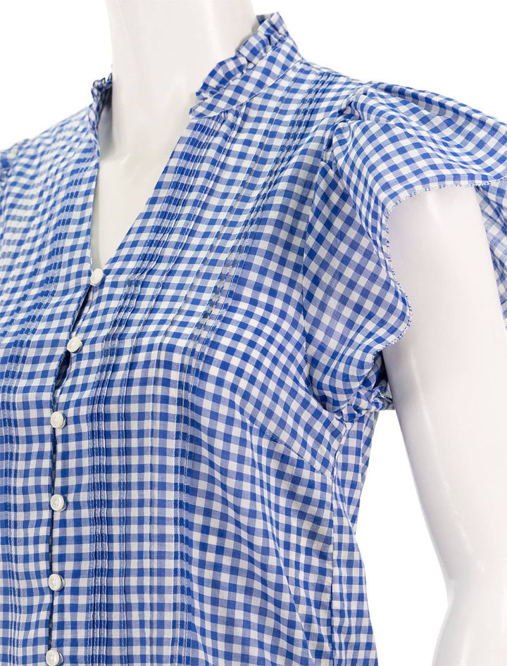 Close-up view of Birds of Paradis' cate blouse in cobalt check.