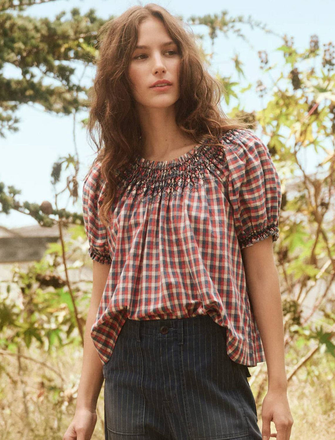 Model wearing The Great's the fair top in picnic plaid.