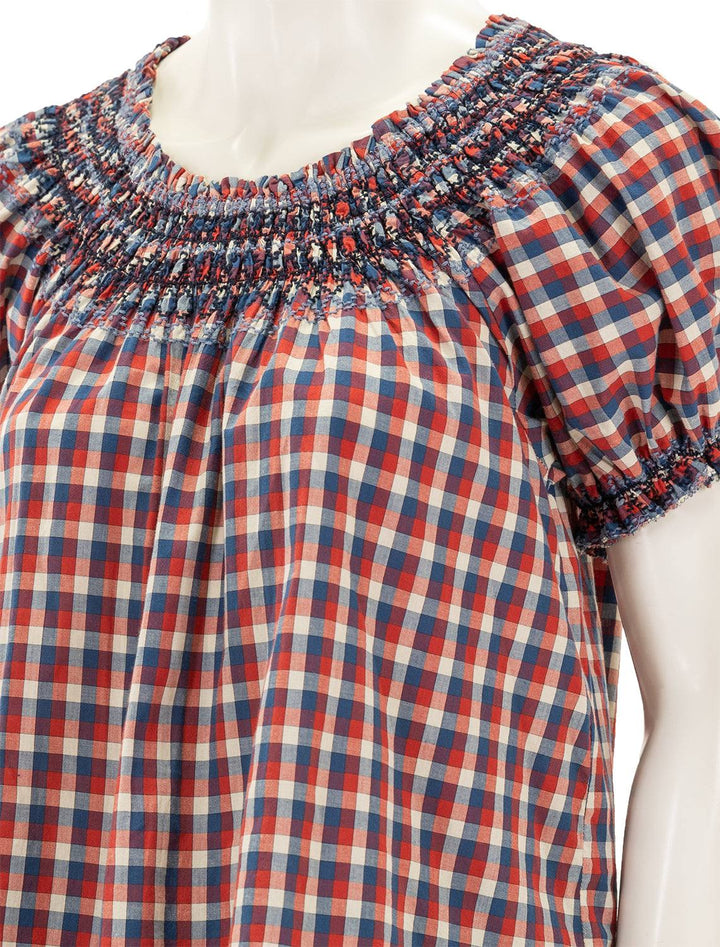 Close-up view of The Great's the fair top in picnic plaid.