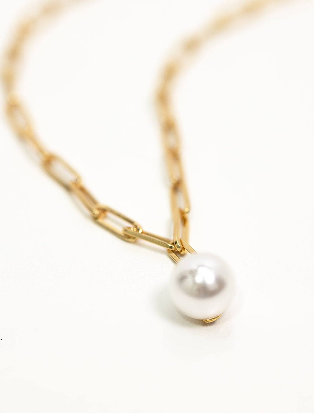Tai jewelry's chain link necklace with pearl accent in gold.
