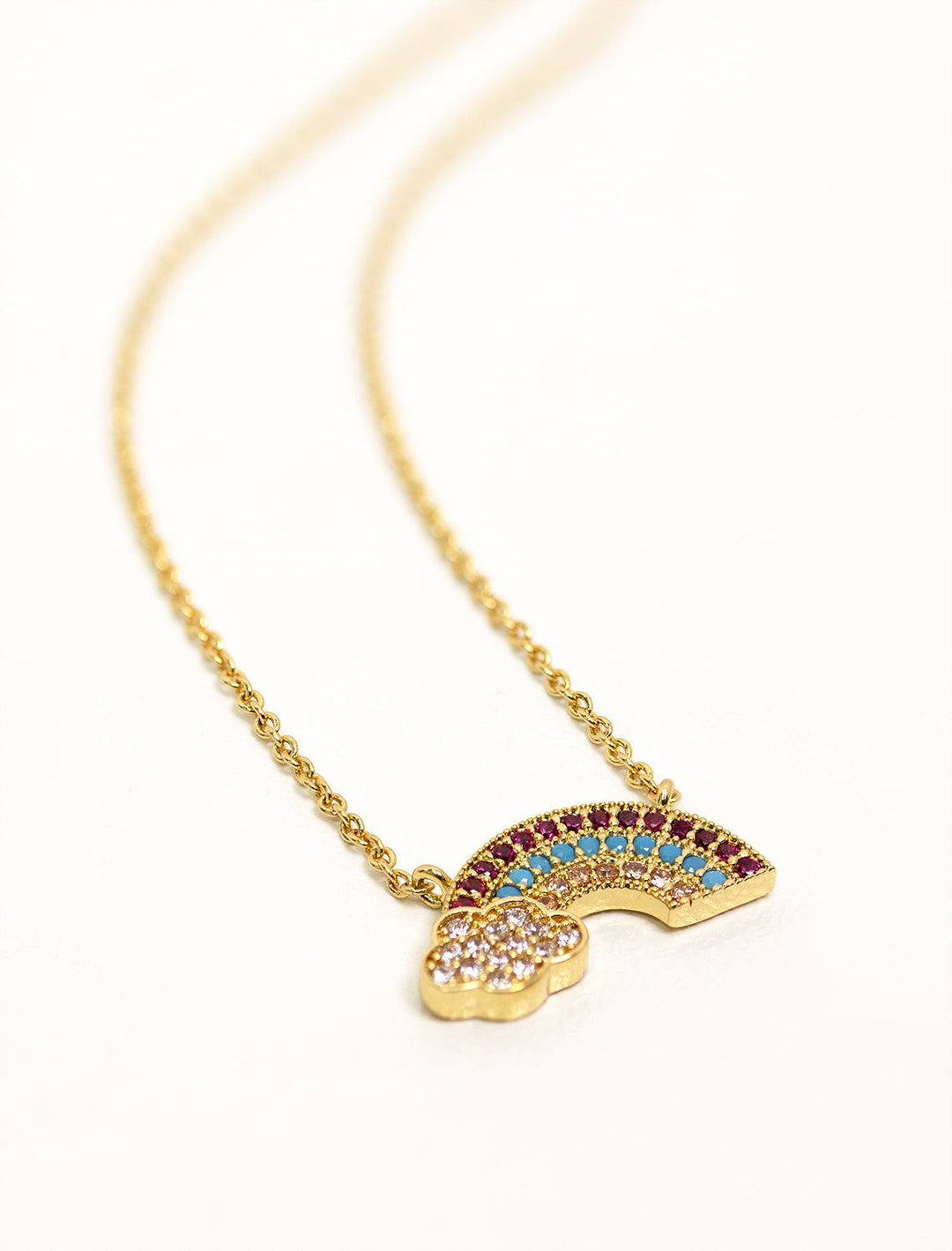 Tai jewelry's rainbow and cloud pave cz necklace in gold.