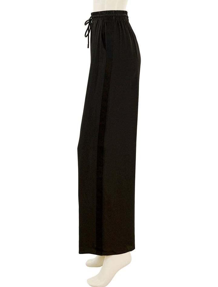 Side view of ATM's wide leg silk pant in black.