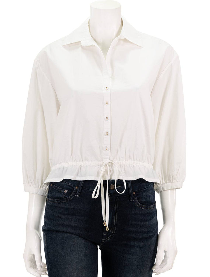 Front view of Cara Cara's hutton top in white.