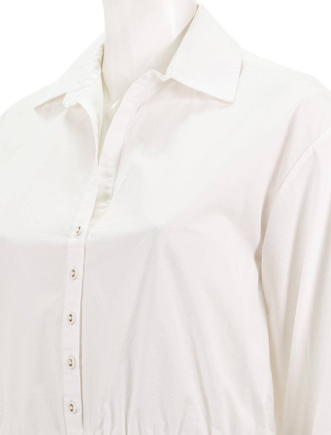 Close-up view of Cara Cara's hutton top in white.