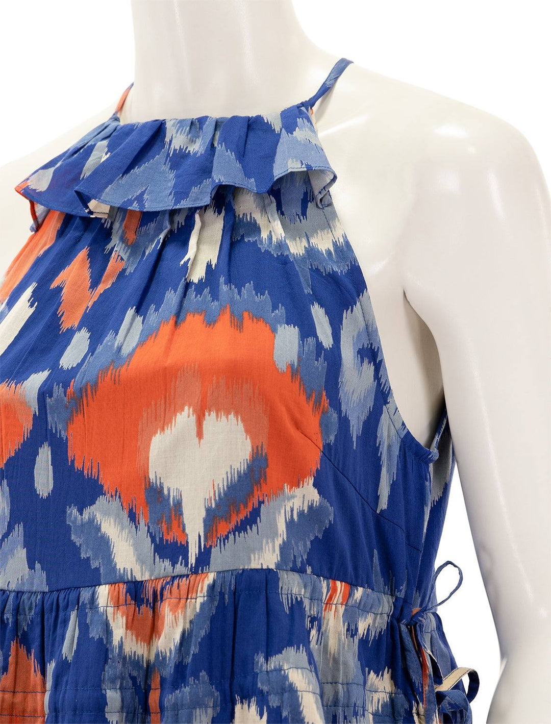 Close-up view of Banjanan's lucia dress in ikat floral sodalite.